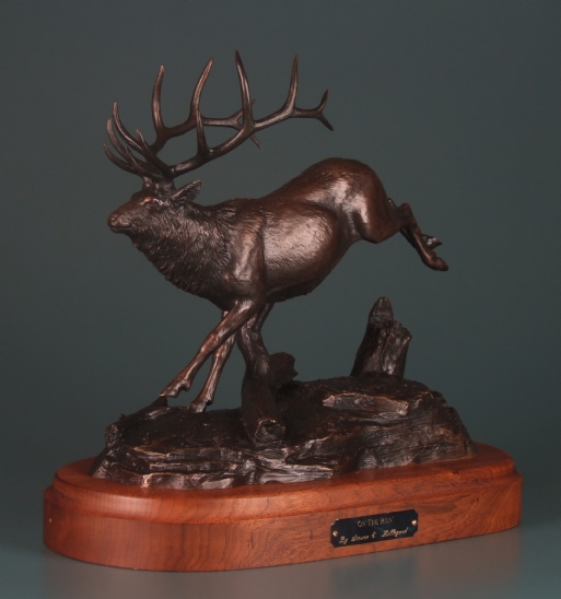 sculpture of elk running